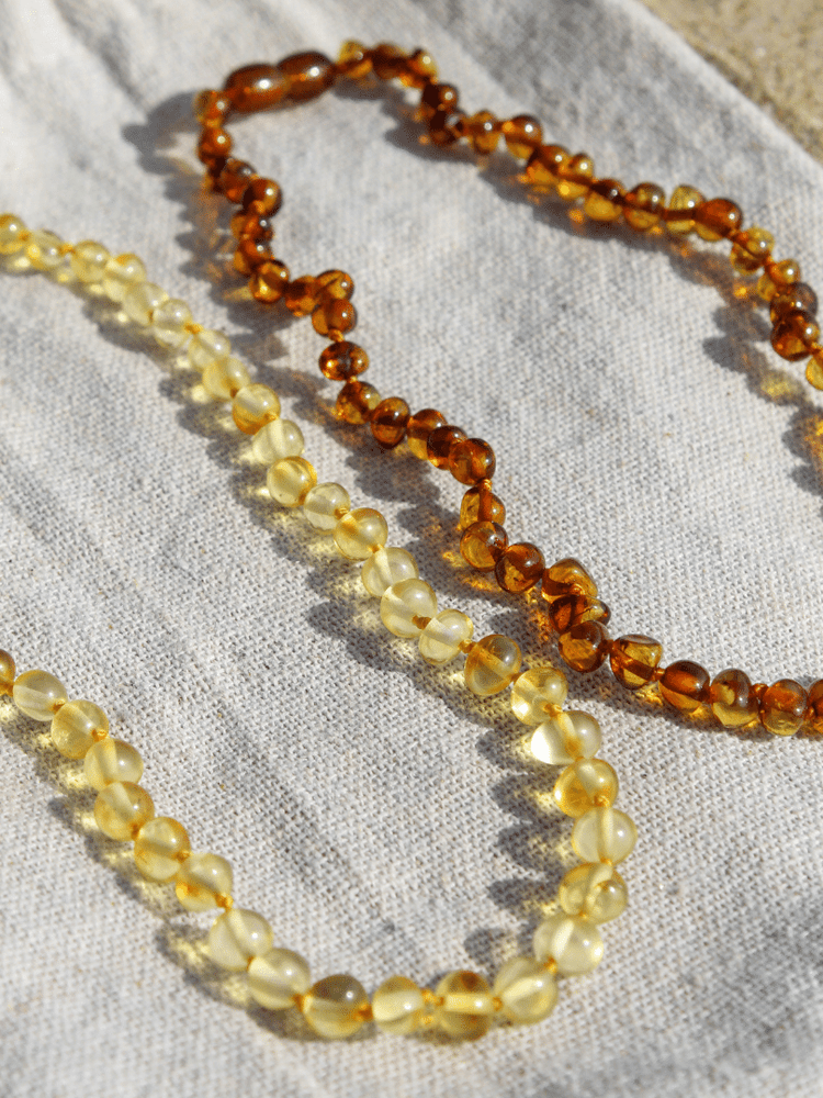 
                  
                    Amber Necklace Cognac (baby - toddler)
                  
                